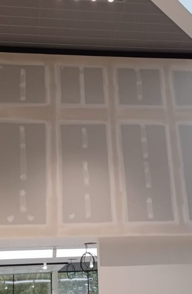 Ceiling grid coordinated with building services